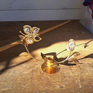 Gold colored butterfly and flower candle holder, crystal accents